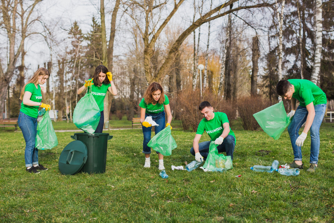 group of volunteers collecting garbage