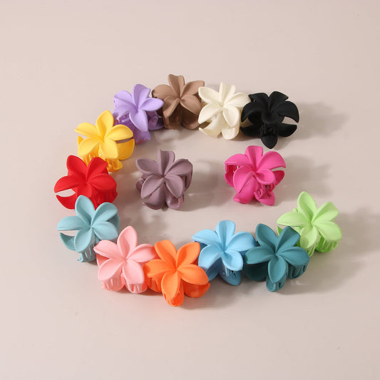 Feather & Red Plastic Flowers Barrettes