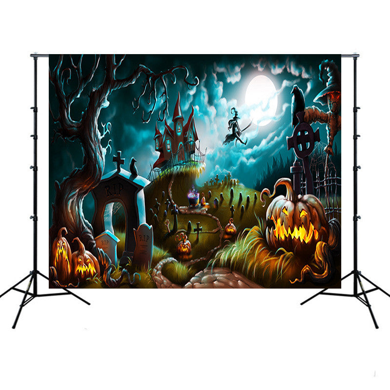 Halloween-themed backdrop with pumpkins, graves, and a haunted house under a full moon.