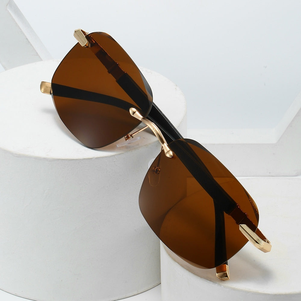 Fashionable Rimless Metal Sunglasses With Cut-out Edges