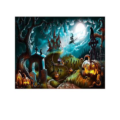 Halloween-themed scene with pumpkins, graves, and a haunted house under a full moon.
